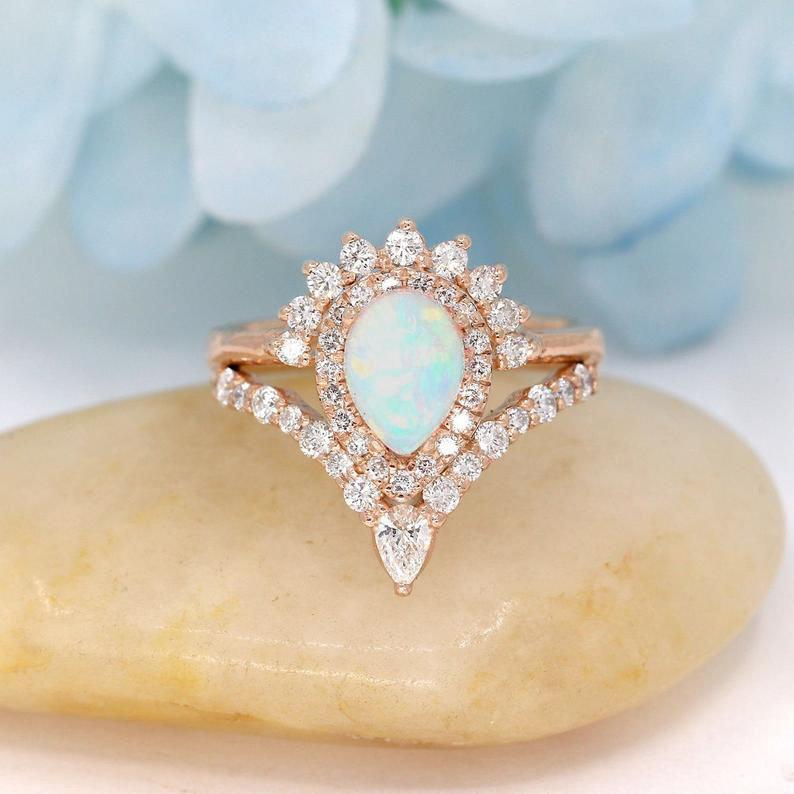 Pear shaped opal engagement ring